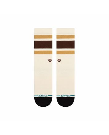 Calcetines Stance Boyd Crew Dark Brown vistos de perfil, con diseño retro a rayas marrón y beige sobre fondo crema