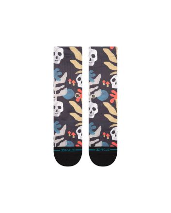 Calcetines Stance Tropiskull Crew en color negro, con diseño floral y calaveras, amortiguación media y caña media-alta