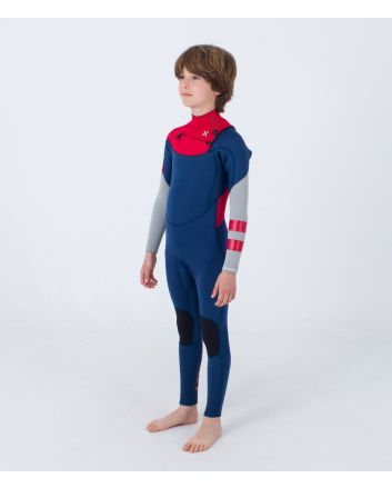Niño con traje de neopreno con cremallera en el pecho Hurley Kid Advant 4/3mm azul marino y rojo 