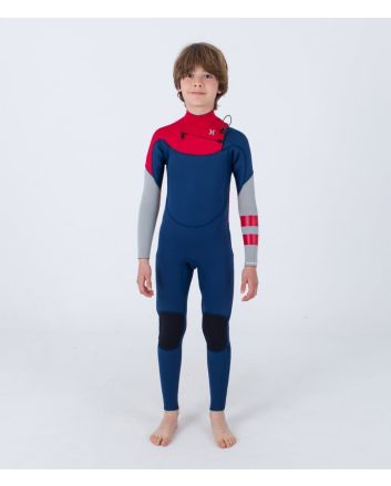 Niño con traje de neopreno con cremallera en el pecho Hurley Kid Advant 4/3mm azul marino y rojo 