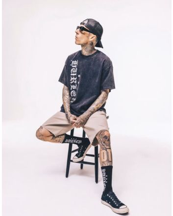 Travis Barker con Pantalón Corto Hurley Silverlake Chino 22'' Khaki