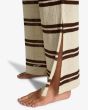 Mujer con Pantalón Playero Billabong Hot Stripe Teak abertura pierna