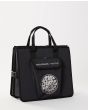 Bolsa para neoprenos Rip Curl Surf Series Anti-Chaos Bucket Negra lateral 