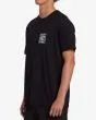 Hombre con camiseta orgánica de manga corta Billabong Coral Gardeners Horizon Negra lateral