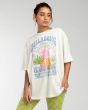 Mujer con camiseta holgada de manga corta Billabong Peace and Love blanca 