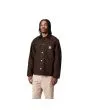 Hombre con abrigo Carhartt WIP Michigan Coat Winter Marrón Tobacco y Negro cerrado