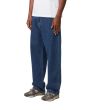 Hombre con Pantalón vaquero Carhartt WIP Landon azul lavado a la piedra lateral