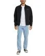 Hombre con Chaqueta Deus Ex Machina Address Workwear Jacket Negra corte regular