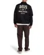 Hombre con Cazadora Deus Ex Machina Workwear Jacket 2.0 Negra posterior