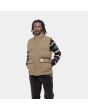 Hombre con chaleco acolchado impermeable Carhartt WIP Milton Vest beige
