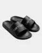 Chlancas Slider Carhartt WIP Slippers en color negro y blanco Unisex