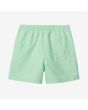 Bañador Carhartt WIP Chase Swim Trunks verde menta con el logo dorado para hombre posterior