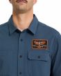 Hombre con camisa de manga corta Volcom Slab City azul bolsillos