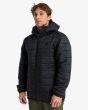 Hombre con Chaqueta Reversible Billabong Transport Revo 10K Jacket Negra reverso lateral