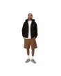 Hombre con Chaqueta Carhartt WIP Hooded American Script Jacket Negra corte holgado