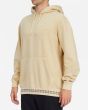 Hombre con sudadera de capucha Billabong Wave Washed amarilla lateral