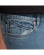 Hombre con Pantalón Vaquero Volcom Solver Denim Old Town Indigo bolsillo