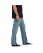 Hombre con Pantalón Vaquero Volcom Solver Denim Old Town Indigo lateral