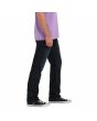 Hombre con Pantalón Vaquero Volcom Solver Denim Vintage Blue lateral