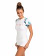Mujer con camiseta de protección solar UPF 50+  Rip Curl Cloud Break Relaxed blanca lateral