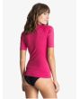 Mujer con Lycra de surf Roxy Whole Hearted rosa posterior