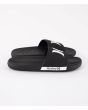 Chanclas Hurley Magu Slide negras y blancas para hombre lateral