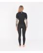 Mujer con traje de surf con cremallera en el pecho Hurley Advantage Plus 4/3mm negro y amarillo posterior