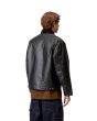 Hombre con Cazadora Carhartt WIP OG Dean Jacket Negra posterior