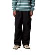 Hombre con pantalones Carhartt WIP Cole Cargo Negros