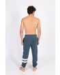 Hombre con pantalón de chándal Hurley Oceancare Block Party Fleece Pant azul posterior