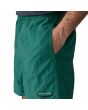Hombre con bañador Patagonia Baggies Shorts 5in 95 Oval Logo Verde bolsillo lateral