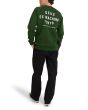 Hombre con Sudadera Deus Tokyo Address Crew Hillside Green espalda