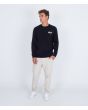 Hombre con sudadera Hurley Wave Tour negra frontal