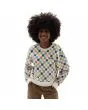 Mujer con sudadera Vans All Over Crew blanca con estampado a cuadros