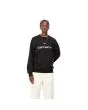 Mujer con sudadera Carhartt WIP Women's Carhartt Sweat negra con logo blanco