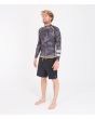 Hombre con Top de Neopreno reversible Hurley Advantage Plus 1/1 mm amarillo reverso camuflaje izquierda