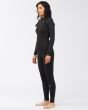 Mujer con traje de neopreno con cremallera frontal Billabong Synergy 4/3mm negro lateral