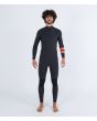 Hombre con traje de surf con cremallera en el pecho Hurley Plus 4/3mm negro grafito
