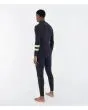 Hombre con traje de surf Hurley Plus 4/3mm Fullsuit Negro-Lemon lateral posterior