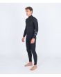 Hombre con Traje de surf Hurley Air 3/2mm Chest Zip negro lateral izquierda