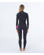 Mujer con traje de surf con cremallera en el pecho Hurley Plus 4/3mm negro grafito posterior