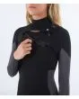 Mujer con traje de surf con cremallera en el pecho Hurley Advant Women 3/2mm Fullsuit negro bolsillo llaves