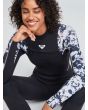 Mujer con traje de neopreno con cremallera en el pecho Roxy Elite 4/3mm negro floral mangas