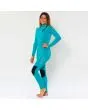 Mujer con traje de neopreno con cremallera en el pecho Sisstrevolution Seven Seas 3/2mm turquesa lateral 