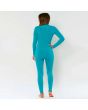 Mujer con traje de neopreno con cremallera en el pecho Sisstrevolution Seven Seas 3/2mm turquesa espalda
