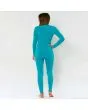 Mujer con traje de neopreno con cremallera en el pecho Sisstrevolution Seven Seas 3/2mm turquesa espalda