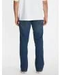 Hombre con Pantalón Vaquero Volcom Vorta Denim Retro Azul posterior