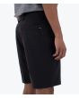 Hombre con Bermudas Híbridas Hurley Phantom Heather 20inch Negras derecha
