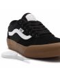 Zapatillas Vans Chima 2 negras con banda lateral sidestripe blanca  y suela de goma para hombre cordones