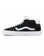 Zapatillas Vans de caña media Mid Skool negras y banda lateral blanca Unisex izquierda